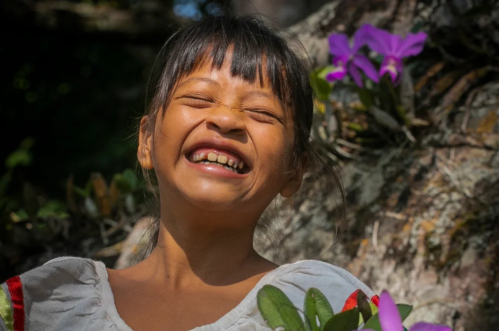Comunidad El Carmen - Misiones Jesuíticas de Chiquitos Niña chiquitana sonriendo